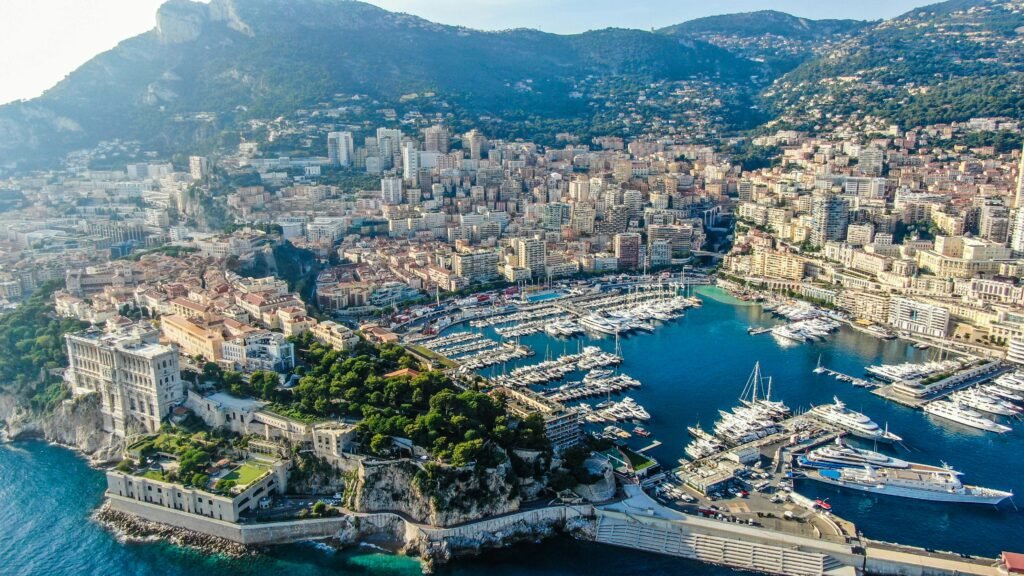 A stunning aerial view of Monte Carlo with its vibrant harbor and skyline.